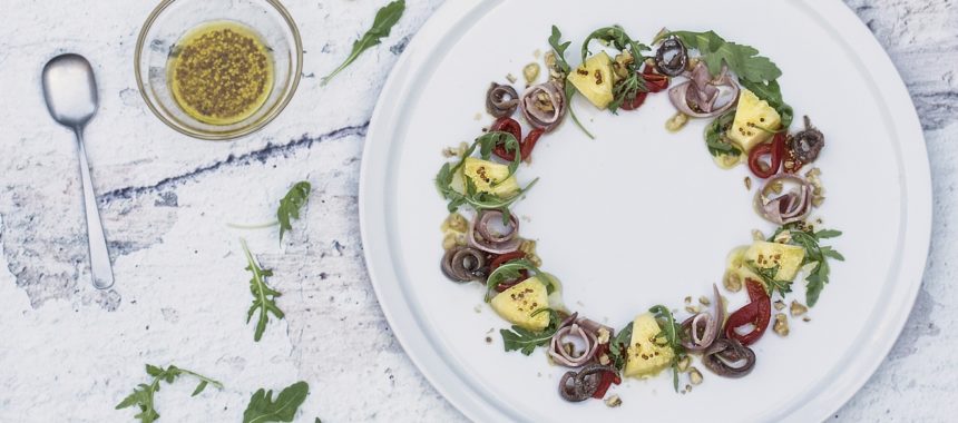 Special salad with pineapple and anchovies