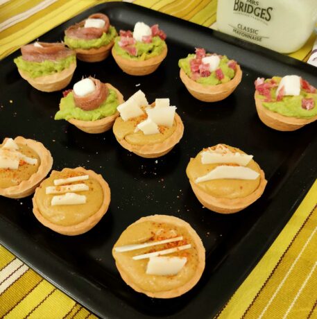 Christmas canapes: trio of tartlets with anchovies and mussels